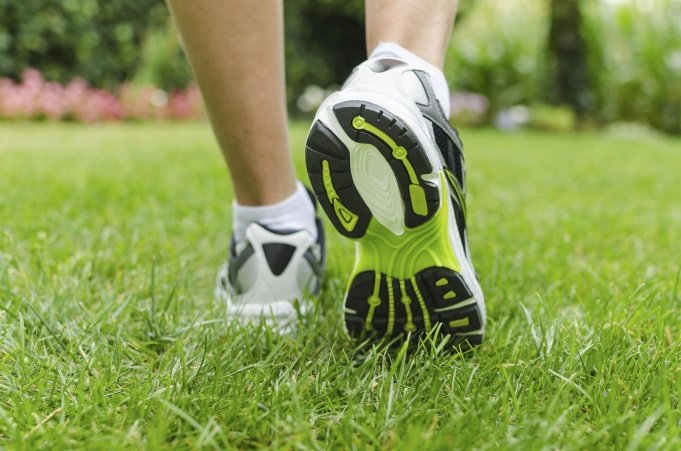 Person Walking in Sneakers